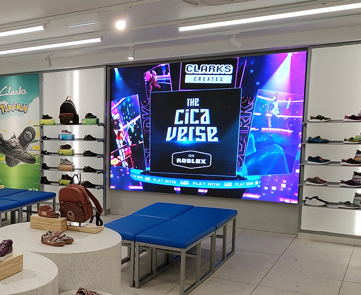 led signage screen inside shoe shop