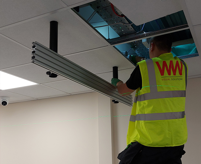 ww installation of digital signage on the ceiling