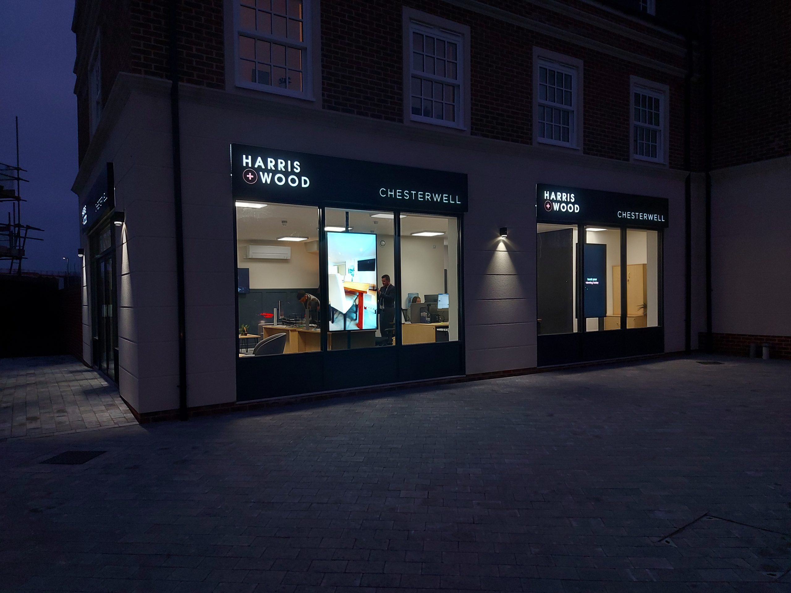 High brightness digital signage screen used in an estate agent shop window