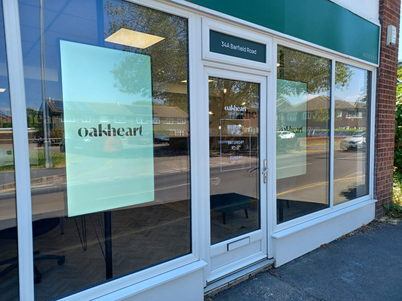 Estate agent shopfront using digital signage to advertise properties and services
